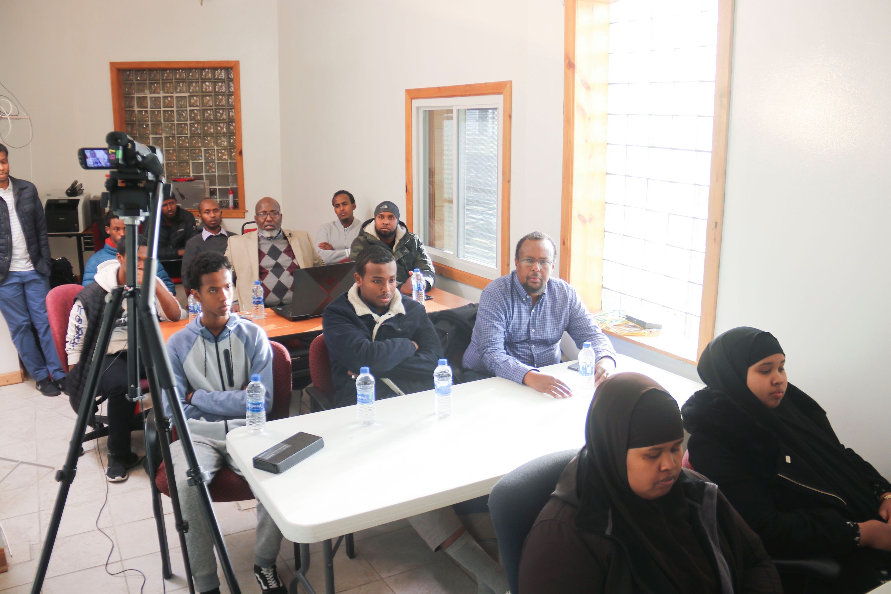 Young professionals learning IT skills