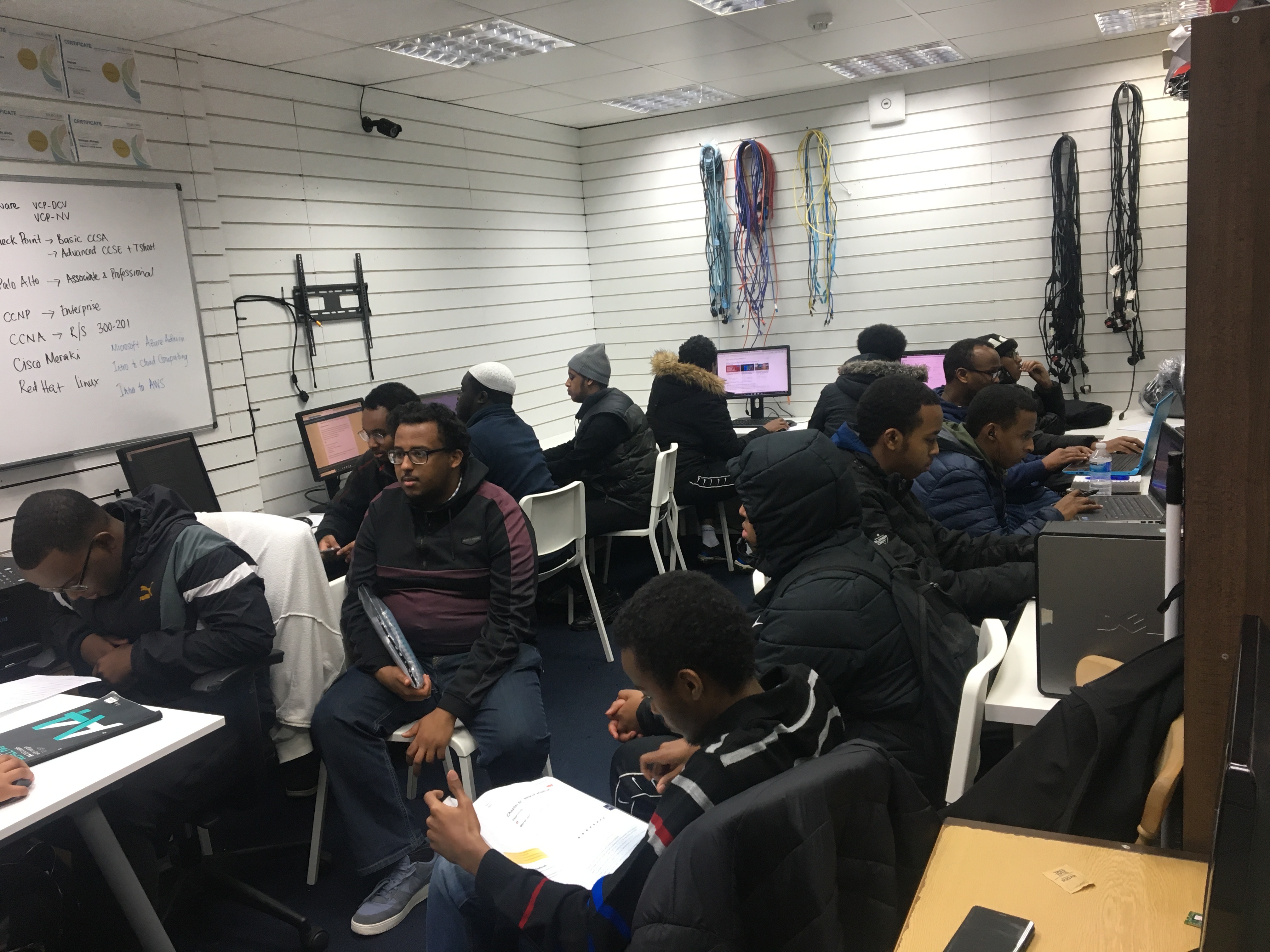 Young professionals learning IT skills