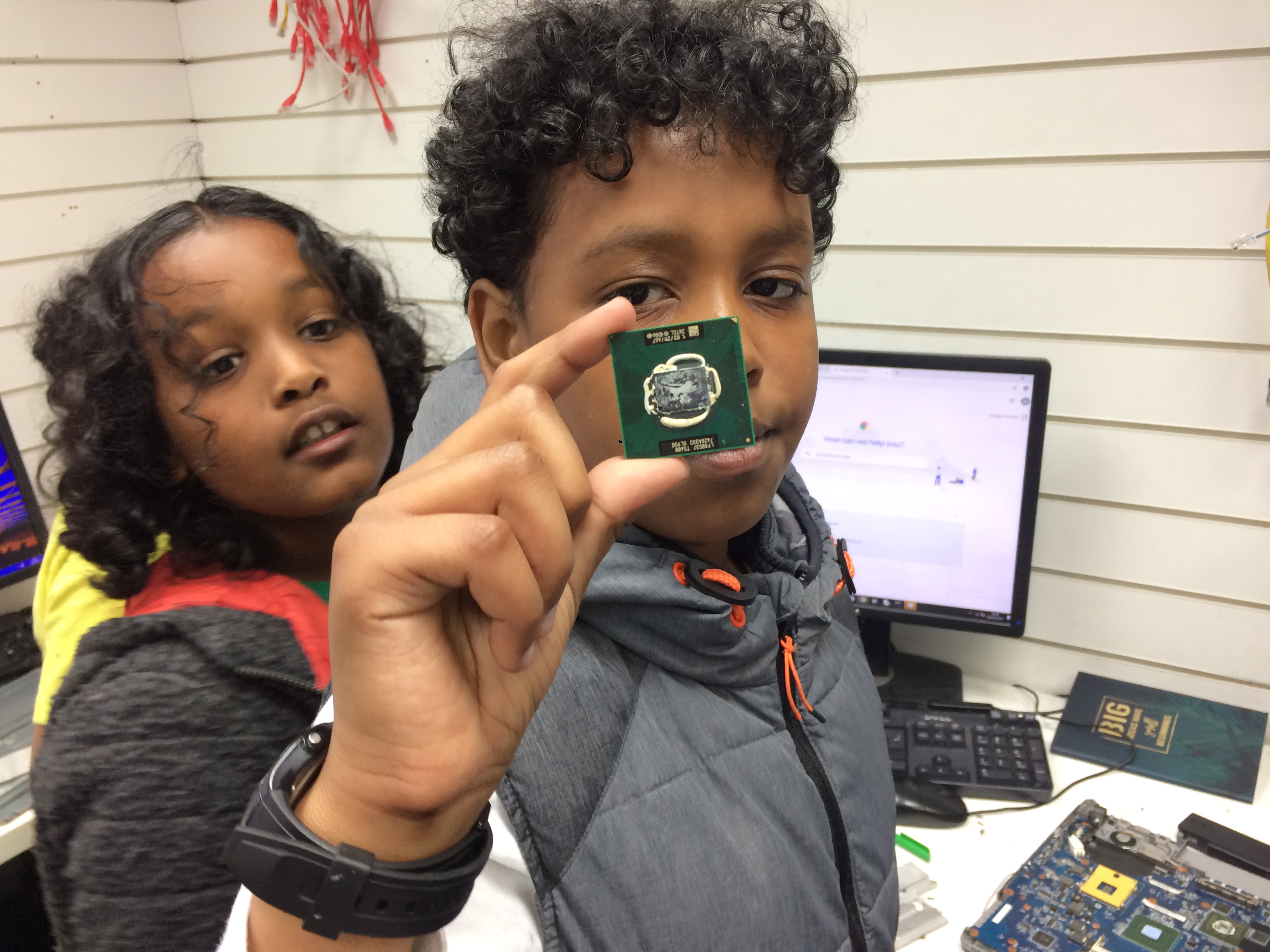 Young professionals learning IT skills